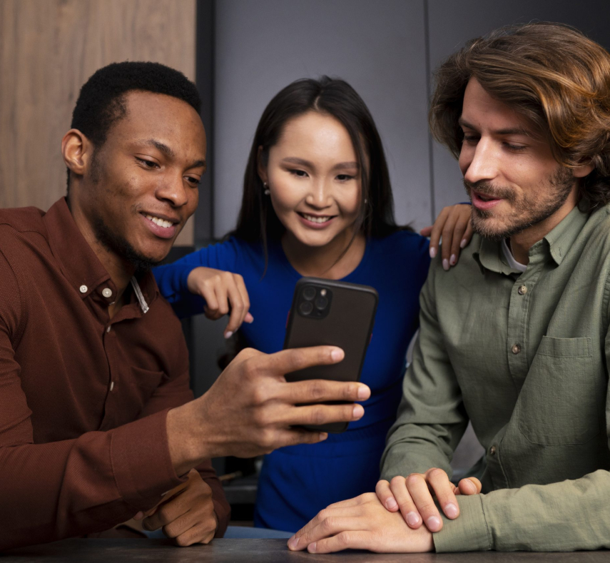 medium-shot-friends-reading-cell-phone-messages